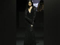
    Tara Sutaria walks at Lakme Fashion Week X FDCI
    