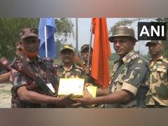 
      
      West Bengal: BSF, BGB exchange sweets at India-Bangladesh Border
      
      