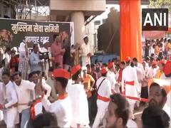 
      
      Muslims in Nagpur shower flower petals on Ram Navami procession
      
      