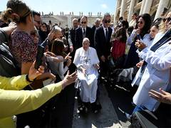 
      
      Pope makes first appearance at Vatican after leaving hospital  
      
      