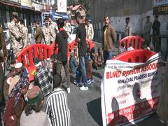 
      
      HP: Visually impaired protesters block roads in Shimla, demand ba
      
      