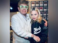 
      
      Madonna, Elton John end 20-year feud
      
      