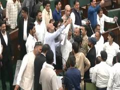 
      
      Chaos in JK Assembly over Waqf Act, PDP MLA Waheed Para marshalle
      
      