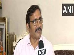
      
      Police officer Hemant Bawdhankar applauds NIA 
      
      