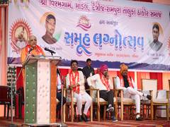 
      
      Gujarat CM Bhupendra Patel attends 21st Samooh Lagnotsav
      
      