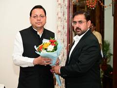 
      
      J-K minister Satish Sharma meets Uttarakhand CM Dhami
      
      