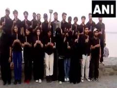 
      
       Students from J-K hold candlelight march near Sukhna Lake 
      
      