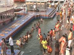 
      
      Devotees take a holy dip in Ganga
      
      