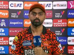 
      
      Unadkat brushes away 