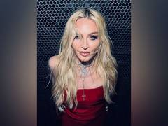 
      
      Madonna returns to Met Gala, hits red carpet with a cigar
      
      