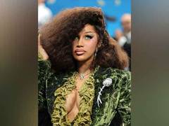 
      
      Cardi B brings dandyism to life at the 2025 Met Gala
      
      