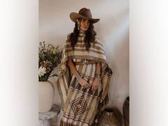 
      
      Nikki Reed embraces Himalayan culture with hand-knit dress
      
      