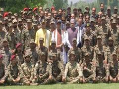 
      
      Defence Minister Rajnath Singh interacts with soldiers
      
      