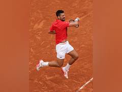 
      
      French Open: Djokovic moves into third round with win over Moutet
      
      