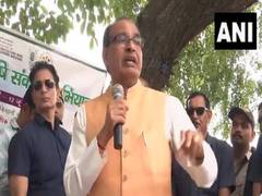 
      
      UP: Union Minister Shivraj Singh Chouhan interacts with...
      
      