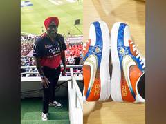 
      
      Chris Gayle's viral look: Turban for PBKS, jersey for RCB
      
      