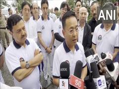 
      
      Sikkim CM performs yoga in Gangtok on 11th IYD
      
      