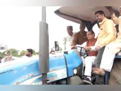 
      
      Union Minister Chouhan drives tractor during his Indore visit
      
      
