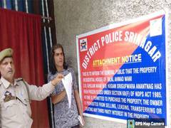 
      
      Srinagar Police attaches property of notorious drug peddler 
      
      