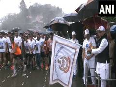 
      
      Himachal Guv flags off annual police half marathon amid rain
      
      