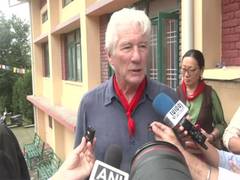 
      
      Richard Gere attends International Tibet Youth Forum 
      
      