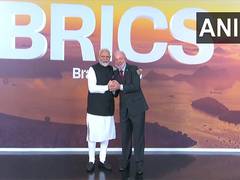 
      
      17th BRICS Summit: shakes hands, shares hug with Brazil Prez
      
      