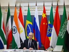 
      
      Putin calls for BRICS to boost national currency use
      
      