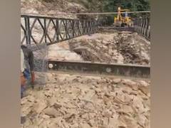 
      
      Bridge washed away after heavy rains in Uttarakhand's Uttarkashi
      
      
