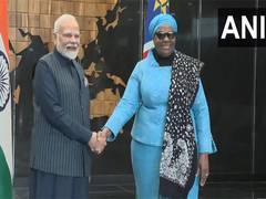 
      
      PM Modi shakes hands with Namibian President at State House
      
      