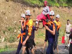 
      
      Himachal SDRF evacuates pregnant woman from flood-hit Janjehli 
      
      