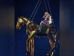 
      
      Beyonce rides gold horse during her Cowboy Carter tour
      
      