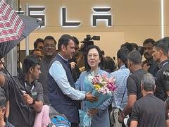 
      
      Maharashtra CM  Fadnavis arrives at  Tesla showroom in Mumbai ahe
      
      