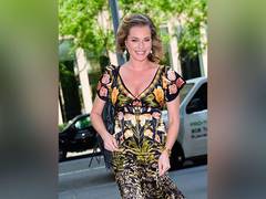 
      
      Rebecca Romijn says she 