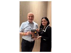 
      
      Anupam Kher presents his book to Colonel Sofiya Qureshi
      
      