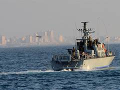 
      
      Israeli navy intercepts Gaza-bound flotilla, detains 21
      
      