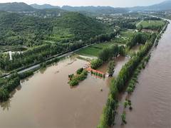 
      
      China: Heavy rain kills 30 in North Beijing
      
      