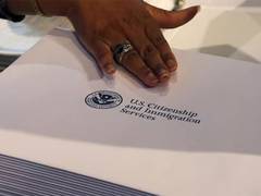 
      
      Indian held in US for possessing 'forged alien resident card'
      
      