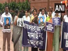 
      
      TMC MPs hold protest at Parliament premises over alleged insult o
      
      