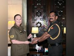 
      
      Indian Subedar Major meets Australian Regimental Sergeant Major
      
      