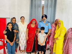 
      
      IAF chief AP Singh meets late Sgt Surendra Kumar's family
      
      
