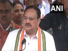 
      
      JP Nadda hoists tricolour at party office
      
      