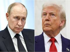 
      
      Trump arrives in Alaska for talks with Putin on Ukraine
      
      