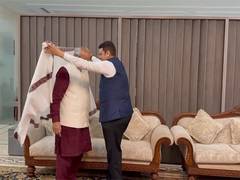
      
      Maharashtra CM Fadnavis presents shawl to CP Radhakrishnan
      
      
