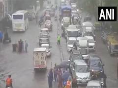 
      
      Mumbai rain delays local trains by 10 to 15 minutes
      
      