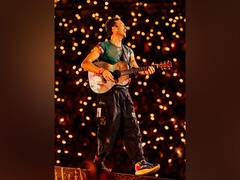 
      
       Chris Martin plans to keep Coldplay’s kiss cam at concerts 
      
      