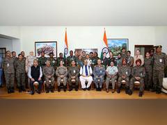 
      
      Rajnath Singh interacts with global women peacekeepers 
      
      