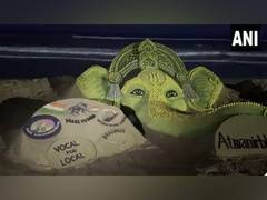 
      
      Odisha: Renowned Sand Artist Pattnaik crafts lemon sand sculpture
      
      
