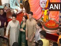 
      
      Sachin Tendulkar visits Lalbaugcha Raja with family 
      
      