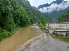 
      
      Badrinath highway submerged, traffic halted
      
      