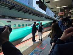 
      
      Japan's PM travels with PM Modi in bullet train from Tokyo to Sen
      
      